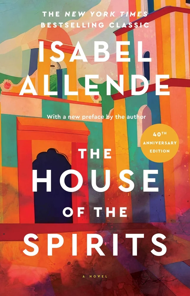 The House of the Spirits by Isabel Allende book cover. Depicts a building in many different colors including reds, oranges, turquoise and yellow.