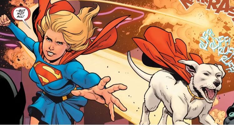 Excerpt from Supergirl #24 comic book, depicting Supergirl, a blonde-haired woman in a blue dress with the S-shield on her chest and a red cape, bursting through a wall in a fighting position. Next to her is Krypto, a white dog with a red cape, who is also bursting through the wall.