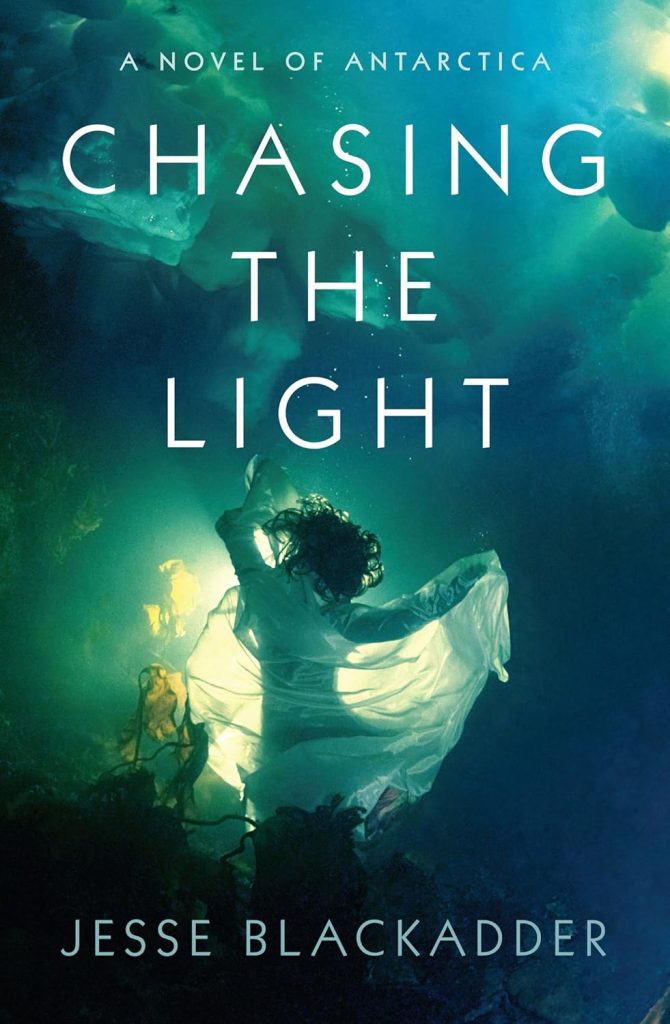 Chasing the Light by Jesse Blackadder book cover. Depicts a woman in a dress submerged underwater.