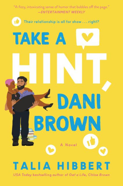 Book cover of "Take a Hint, Dani Brown" by Talia Hibbert. A smiling man carries a woman with pink hair on a yellow background.