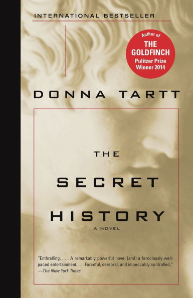 Book cover of "The Secret History" by Donna Tartt. Features a classical statue profile on a sepia background. Red badge reads "Author of The Goldfinch, Pulitzer Prize Winner 2014."