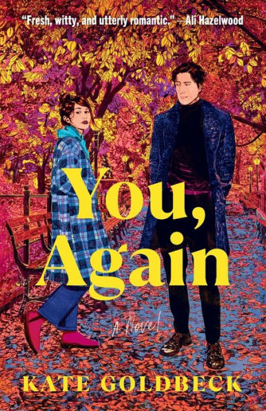 Book cover of "You, Again" by Kate Goldbeck. It features a man and woman in autumn attire with vibrant fall foliage.