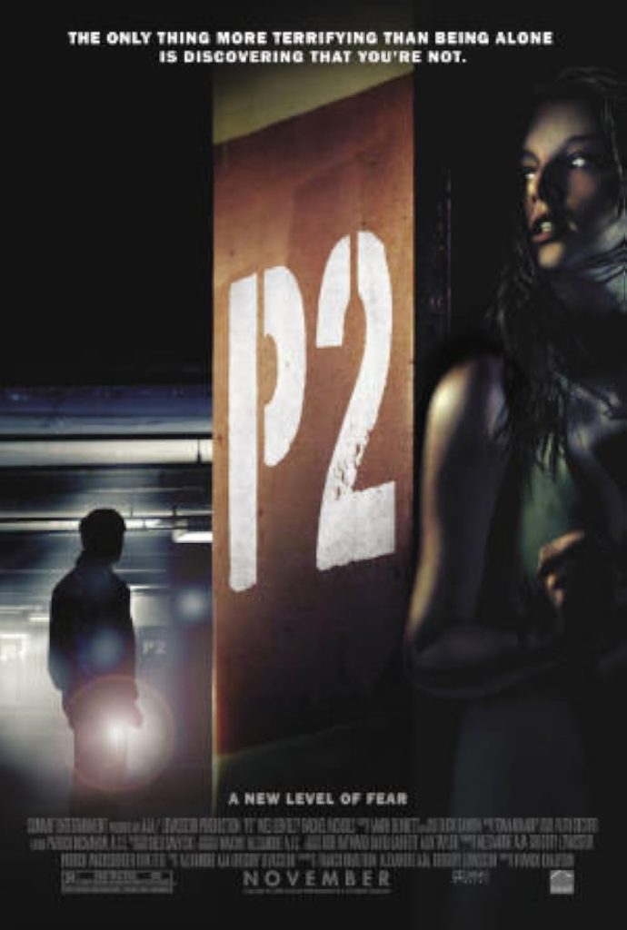 P2 by Franck Khakfoun movie poster depicting a woman hiding behind a concrete support beam while a shadowed man is seen in the background, holding a flashlight.