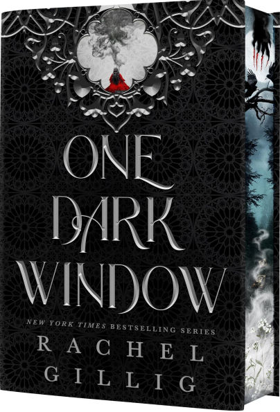 Deluxe collector’s edition of “One Dark Window” by Rachel Gillig. The cover features ornate black gothic patterns with the title in silver lettering, a small illustration of a red-cloaked figure surrounded by smoke at the top, and stenciled edges with a misty forest design visible on the side.