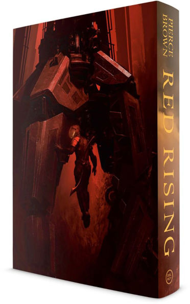 Deluxe hardcover of “Red Rising” featuring a red-toned illustration of a massive armored mech and a lone figure standing before it.