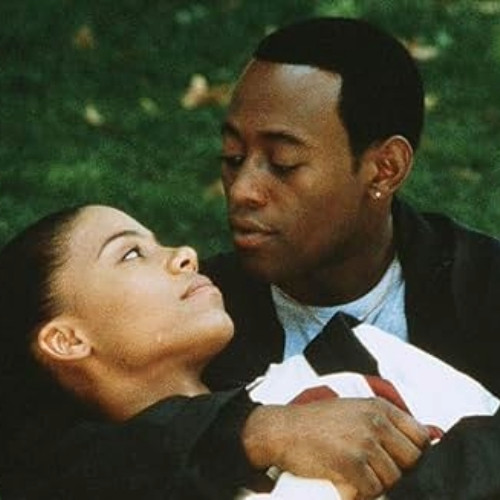 Omar Epps and Sanaa Lathan starring in Love & Basketball, staring into each other's eyes in a romantic embrace.