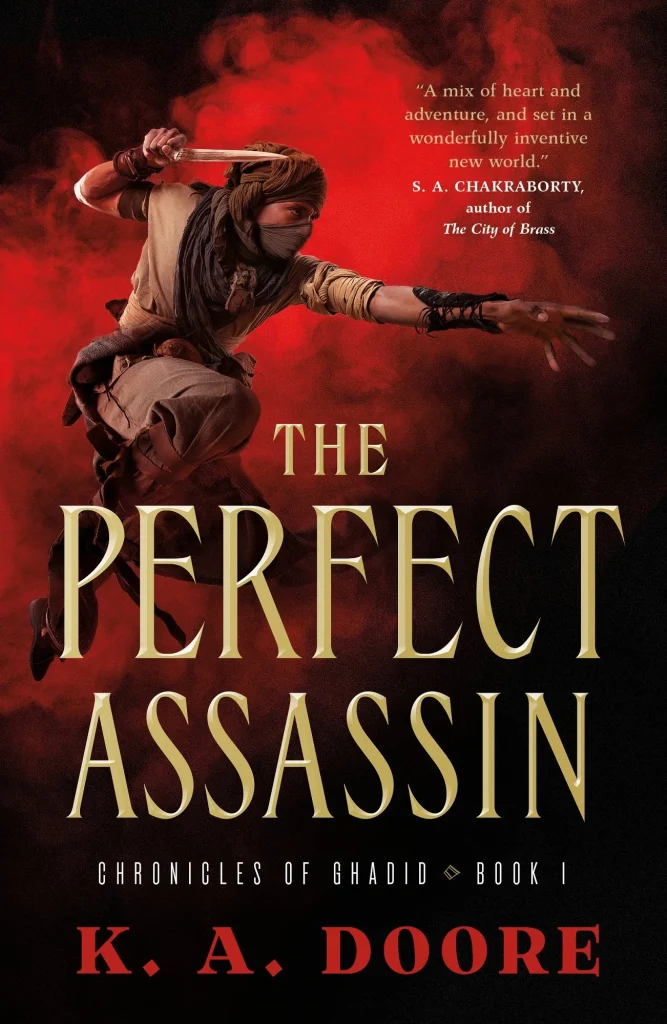 The Perfect Assassin by K. A. Doore, a fantasy novel featuring a leaping figure in desert attire holding a dagger against a red smoky background, evoking mystery and action.