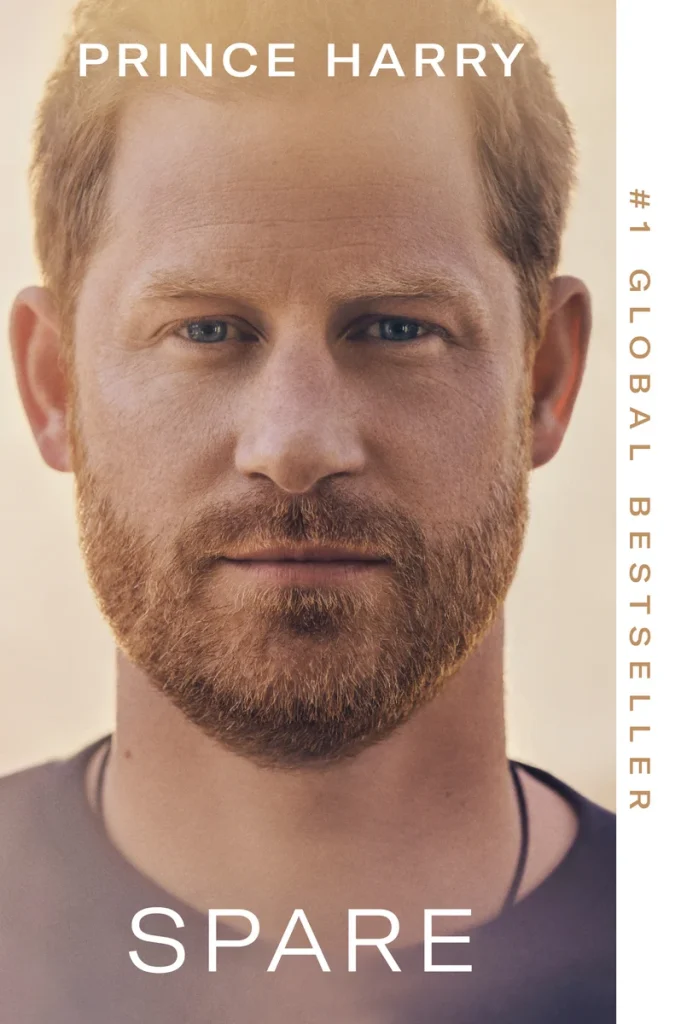 Spare, the memoir by Prince Harry, Duke of Sussex book cover depicts a close up of Prince Harry with red hair and facial hair looking straight ahead.