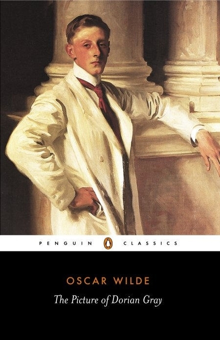 The Picture of Dorian Gray by Oscar Wilde, a penguin classics cover featuring a young Victorian era man.