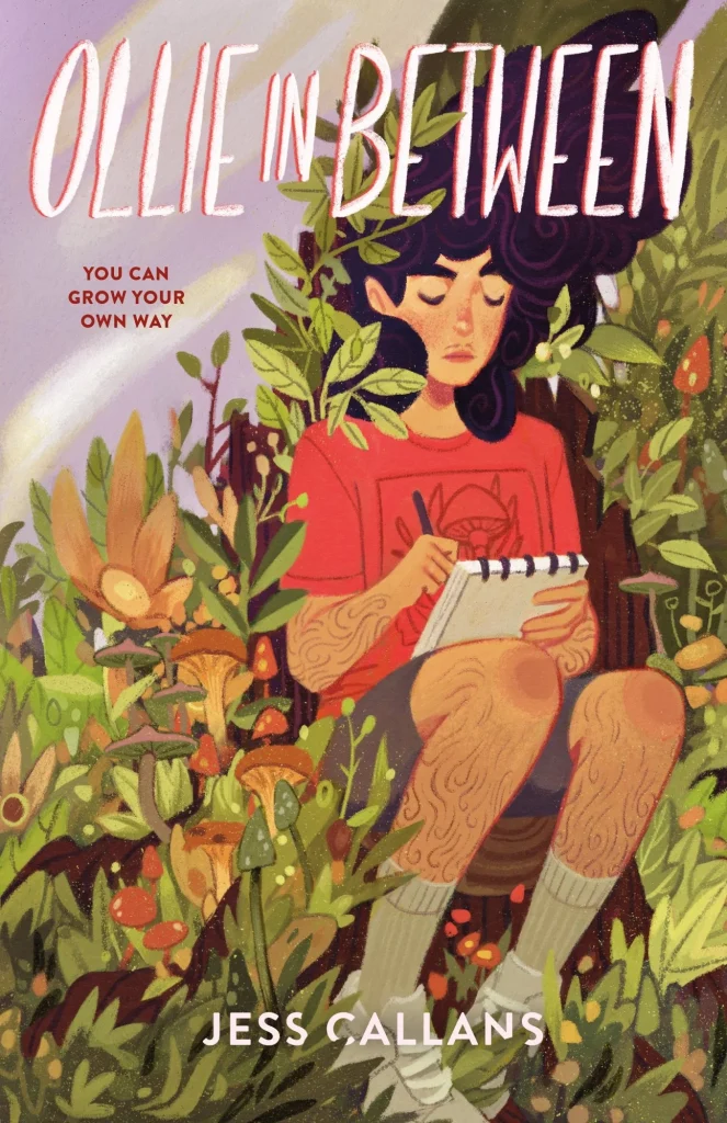 "Ollie In Between" by Jess Callans, a middle grade book cover that shows a person with short dark hair, wearing a red shirt, sitting among tall, lush plants, writing in a notebook. The atmosphere is tranquil and reflective.