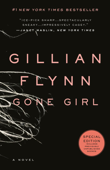 Book cover of "Gone Girl" by Gillian Flynn. Black background with pink text, featuring wisps of hair and a red circle marking it as a special edition.