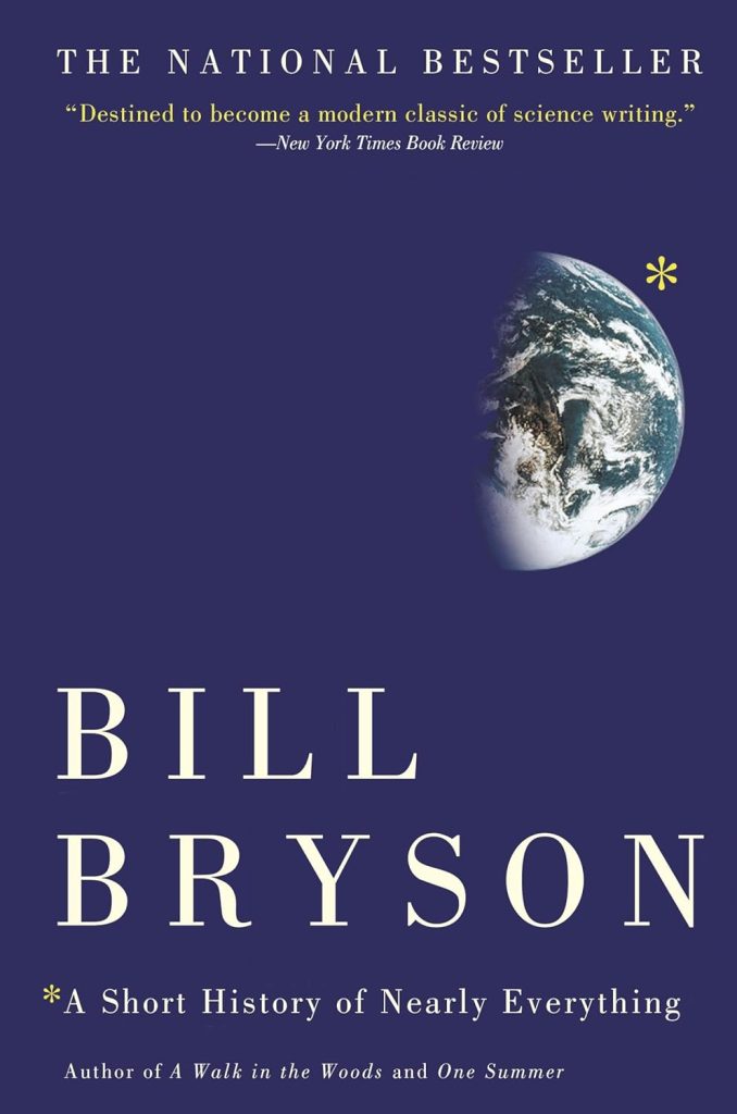 A Short History of Nearly Everything by Bill Bryson, a nonfiction book cover featuring a dark blue background with half of the earth pictured from afar. The title is in an ivory serif font at the bottom of the cover.