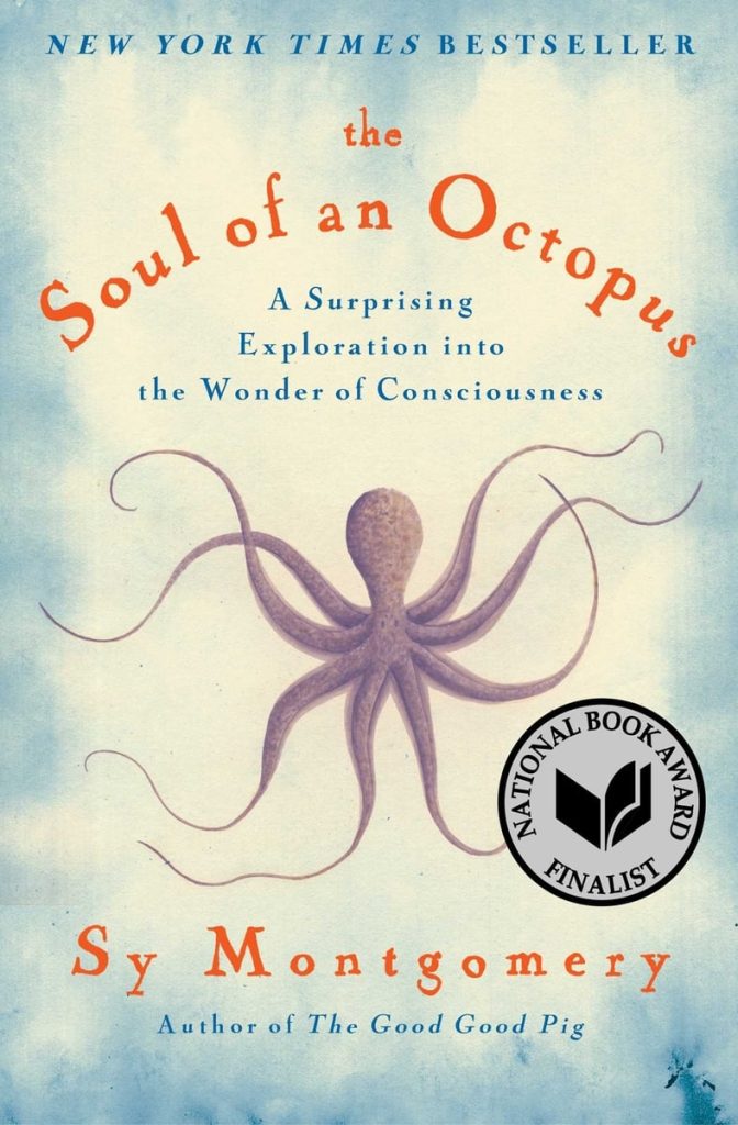 The Soul of an Octopus by Sy Montgomery book cover depicts a purple octopus in the middle of a light blue watercolor background.