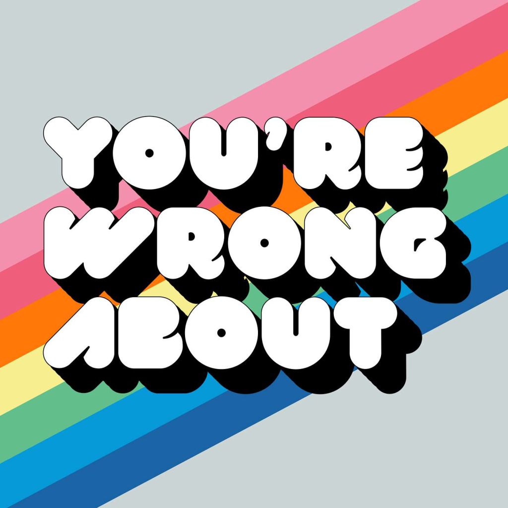 You're Wrong About by Sarah Marshall podcast cover depicting a diagonal pink, orange, yellow, and blue stripes on a grey background. The title of the podcast are in white bubble letters with a black stroke underneath.