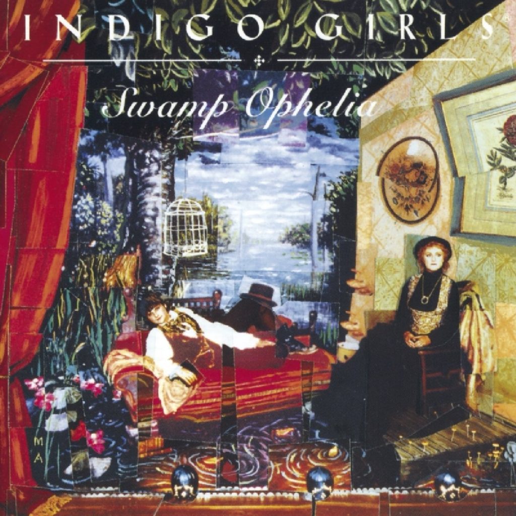 The cover for the album Swamp Ophelia by Indigo Girls. The cover invokes the look of a classic painting. The left side has a red and blue color scheme, with a partial red curtain, flowers in a pond, an empty white birdcage, and a pale-skinned woman lounging on a red chaise in brown breeches and a white blouse. The right side has a yellow color scheme, with floral paintings hung on a greenish yellow wall and a pale-skinned woman wearing a black dress with a golden bodice sitting in a brown chair.