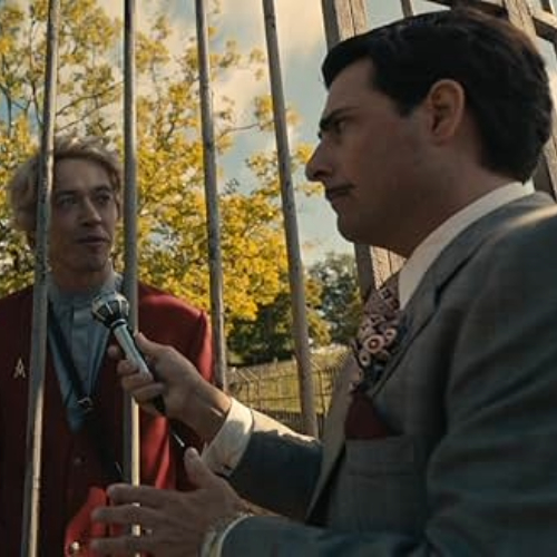 Movie still of Snow in the Ballad, being interviewed by Lucky Flickerman.
