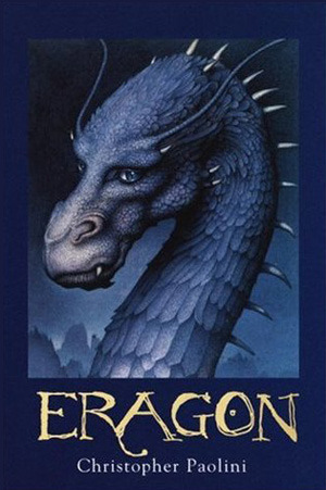 Cover of "Eragon" by Christopher Paolini features a detailed illustration of a majestic blue dragon on a dark background, conveying mystery and fantasy.
