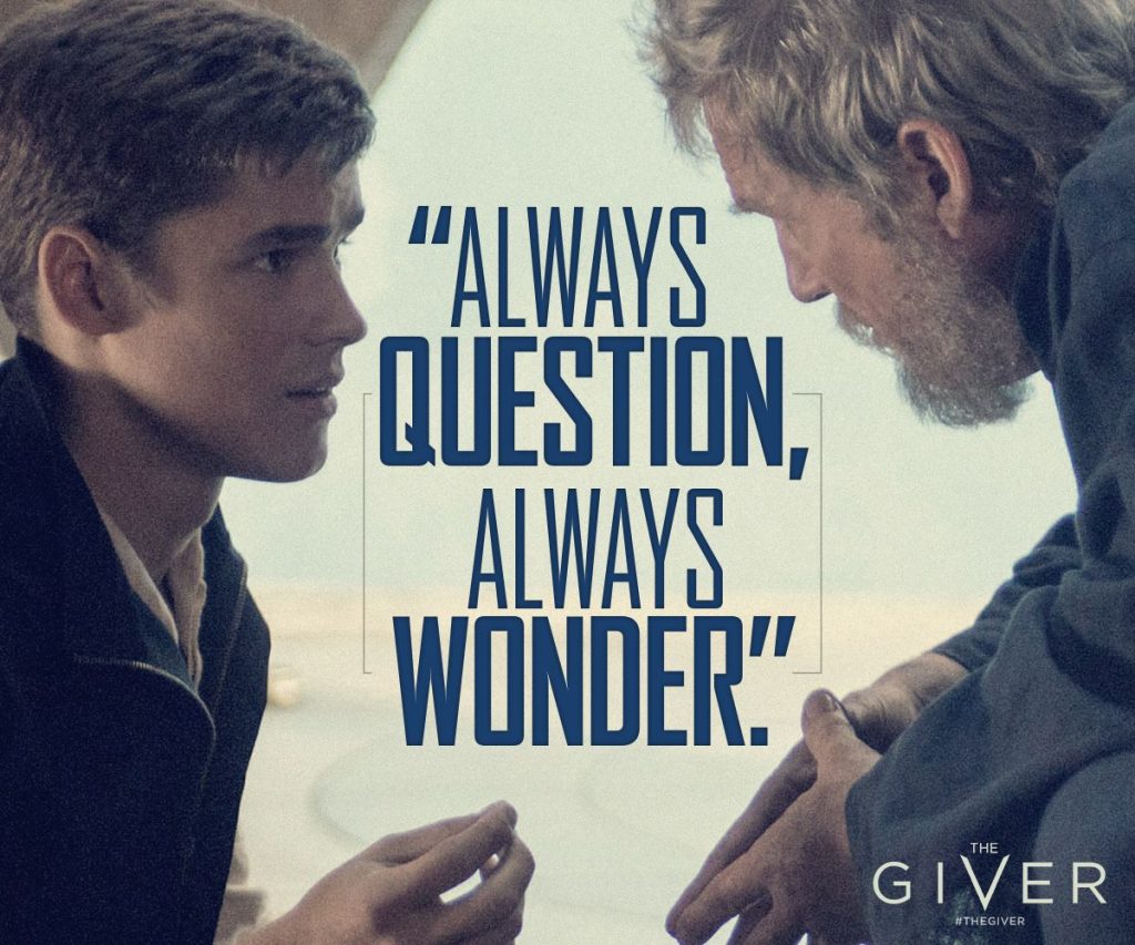 Two men sit facing each other, deep in conversation, movie still from The Giver. Overlaid text reads: "Always question, always wonder."