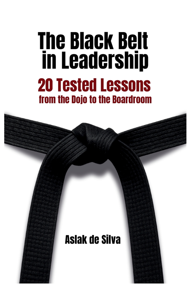 The Black Belt in Leadership by Aslak de Silva, a self-help book cover depicting a black belt encircling a white background.
