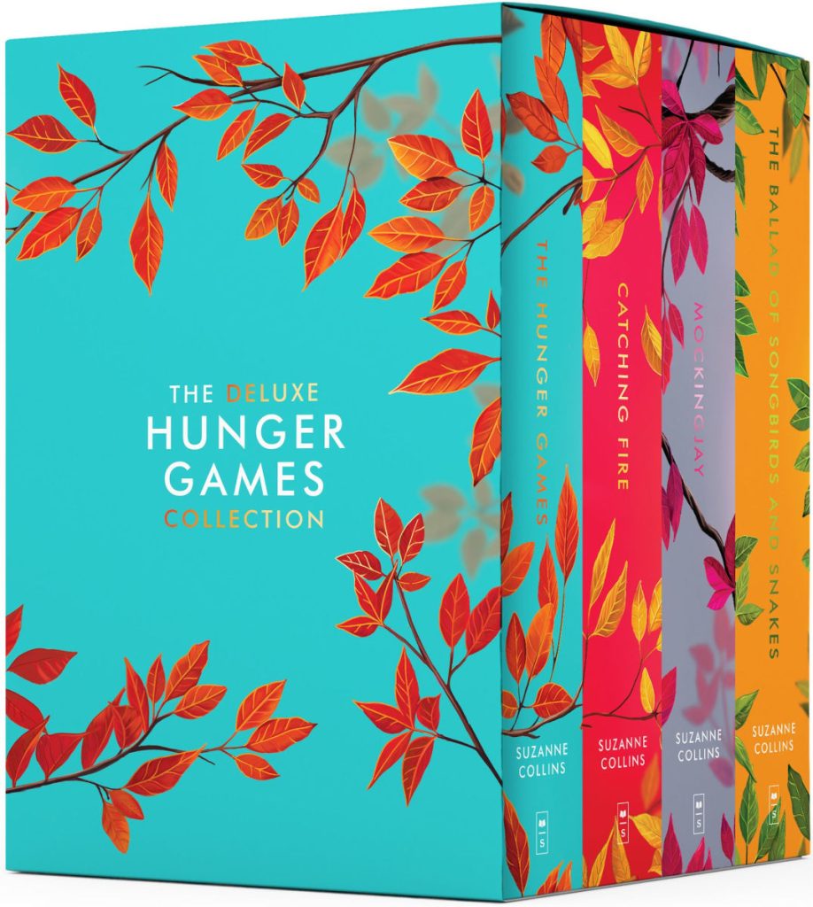 The image features the Hunger Games book series with covers of autumn leaves and branches, with the title in the center of the covers.