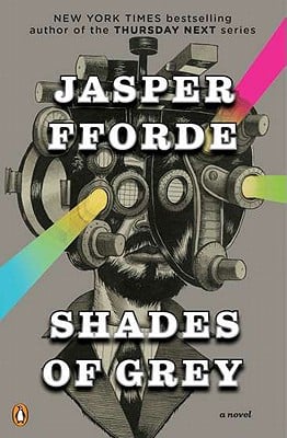 Shades of Grey by Jasper Fforde depicts a man's face and neck with different articles of technology covering his face with lights coming out at different angles.