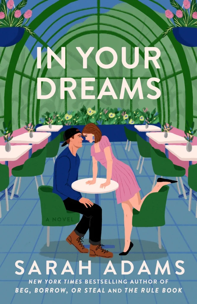 Couple in a greenhouse café, woman leaning playfully over a table to kiss a seated man. Romantic setting with green chairs and floral decor. Text reads "In Your Dreams", a new contemporary romance, by Sarah Adams.