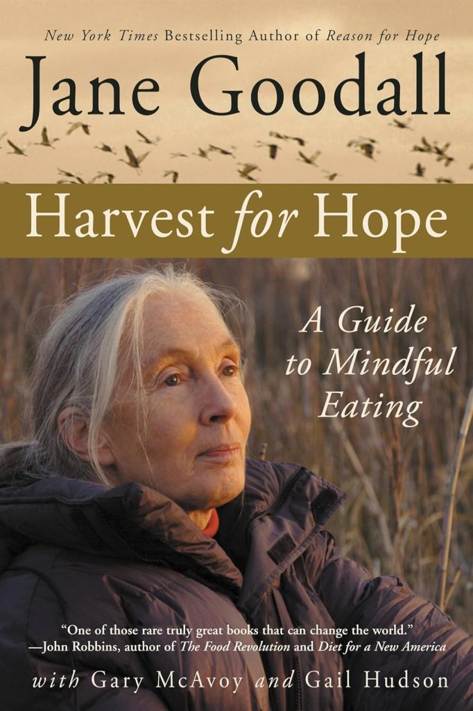 Harvest for Hope by Jane Goodall, Gary McAvoy, and Gail Hudson book cover depicts Goodall looking off in the distance with a flock of birds above.