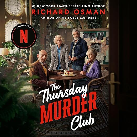 The Thursday Murder Club by Richard Osman, a mystery audiobook cover featuring four people sat or standing around a circular table looking at the camera. On the table is a piece of cake with a knife stabbing it. The background the interior of a building with stained glass, plants, and a board with red string, maps, and photographs on it.