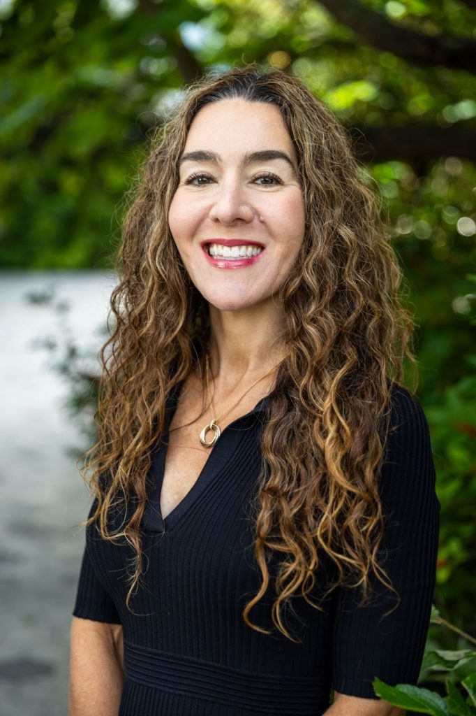 Children's Author Ismée Williams smiling at the camera