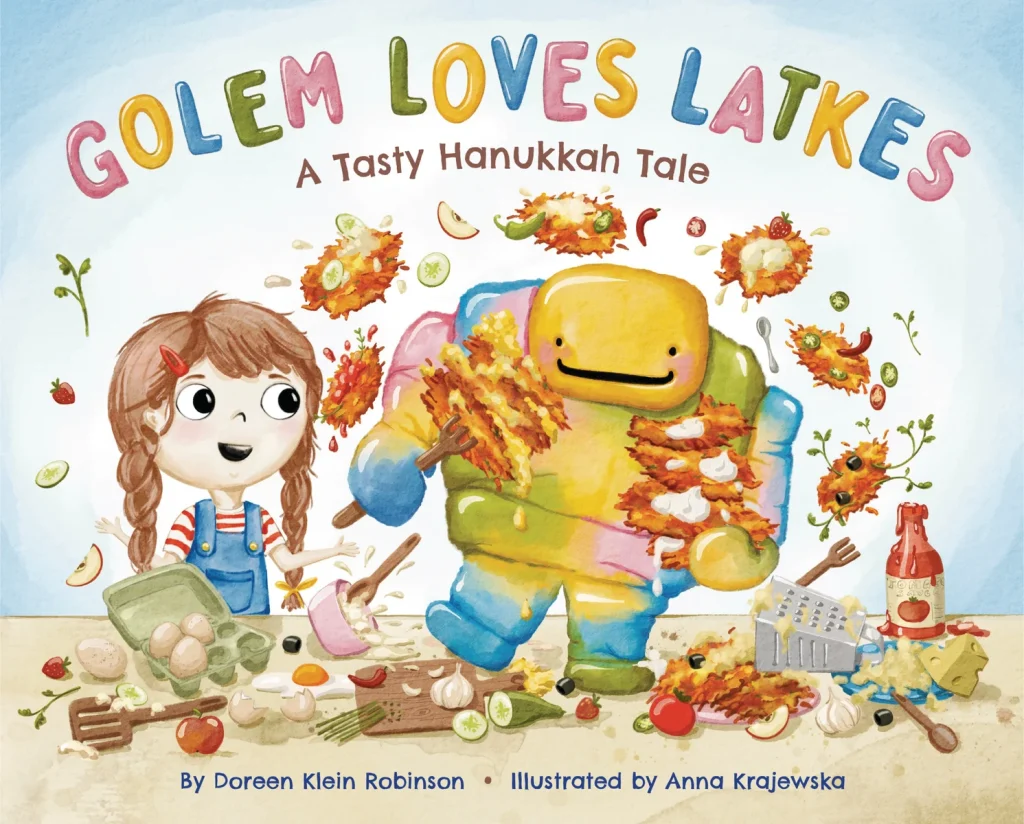 Golem Loves Latkes by Doreen Klein Robinson, illustrated by Anna Krajewska, a festive holiday picture book cover showing a cheerful girl and a colorful golem joyfully cooking latkes amid a playful mess of ingredients.