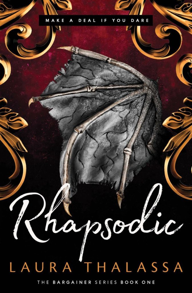 "Rhapsodic" by Laura Thalassa, and there is a single bat wing in the very center