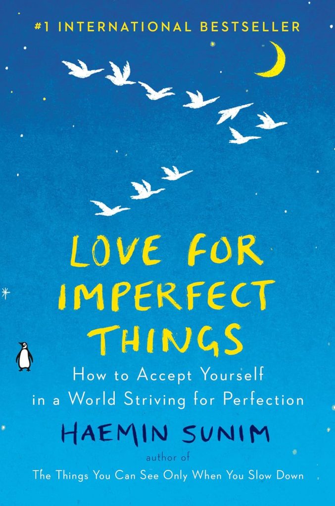 Love for Imperfect Things by Haemin Sunim, a self-help book cover with a flock of white birds flying in a V over a blue night sky decorated with white stars and a yellow crescent moon.